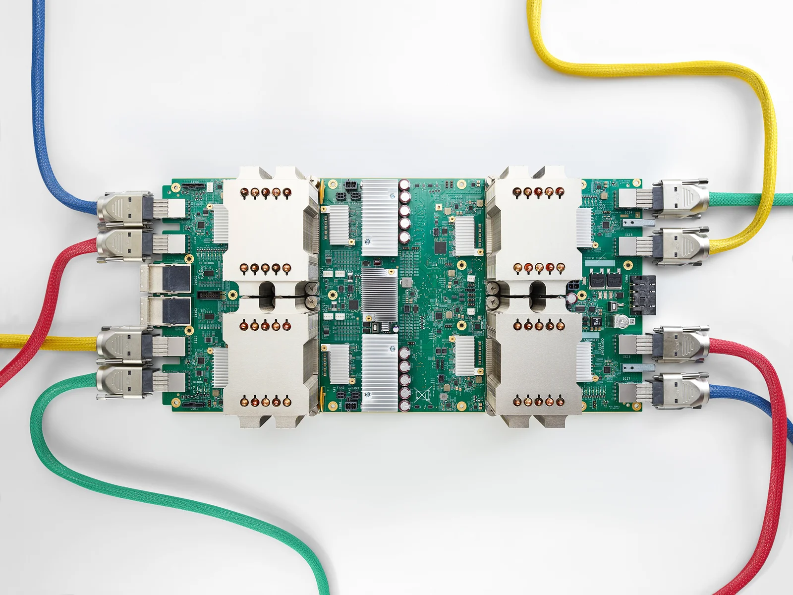 Google second-generation Cloud TPU board connected by colored high-speed interconnect cables
