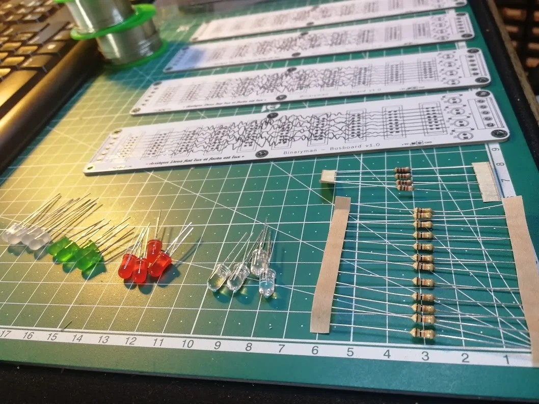 Eurorack bus boards and components laid out before soldering.